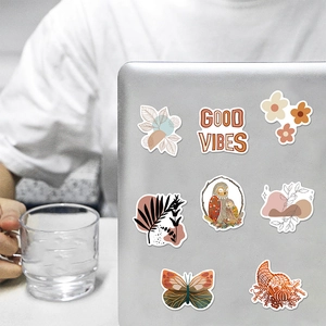 Retro Bohemian waterproof stickers set showing artistic designs on a laptop surface