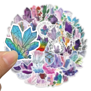 Close-up of waterproof bohemian crystal stickers with vibrant mystical mineral designs