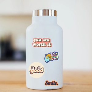 50pcs waterproof inspirational stickers on a white water bottle with positive quotes