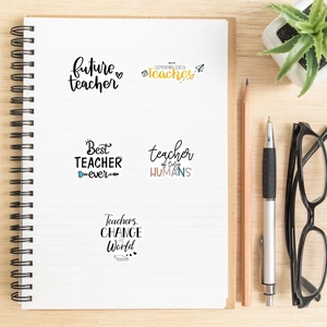 Close-up of waterproof teacher appreciation stickers on a notebook with school accessories