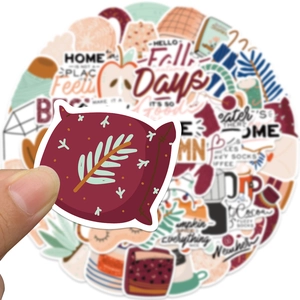 Waterproof autumn graffiti stickers for DIY laptop and luggage featuring cozy hand-drawn art