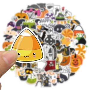 Close-up of a waterproof Halloween candy corn sticker with various spooky decal patterns