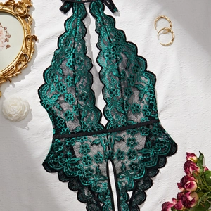 Lace floral teddy bodysuit in green and black featuring halter neck and open back design