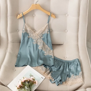 Elegant misty blue satin sleepwear set for women with V-neck lace trim camisole and shorts
