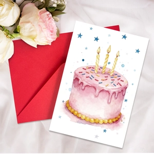 Detail of hand-painted watercolor birthday card with cake design and red envelope
