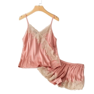 Women's two-piece silk satin pajamas set with lace trim camisole and shorts in lotus pink