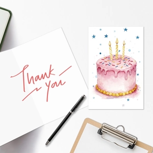 Detail of pink watercolor birthday cake card and elegant thank you note with envelope