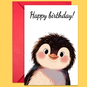 Close-up of cute penguin birthday card with Happy Birthday text and red envelope