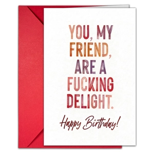 Detail of white birthday card with red envelope featuring bold colorful typography