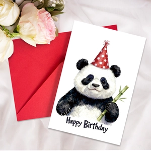 Detail of cute panda illustration birthday card with red envelope on white fabric