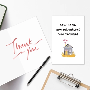 Detail of housewarming greeting cards with new adventures text and colorful house illustrations