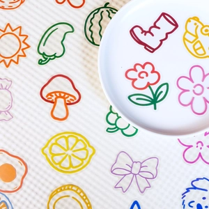 Detailed view of colorful PET transparent stickers with cute food and flower patterns