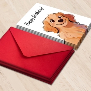 Cute dog illustration birthday cards with red envelopes on a light wooden background