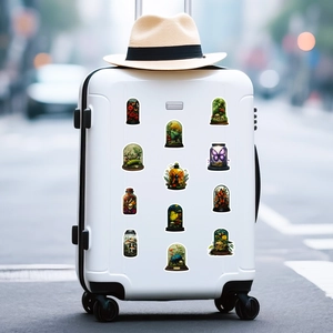 Detail of vintage insect and floral stickers applied to a white suitcase surface
