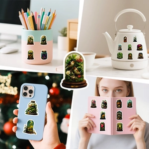 Flower and insect bottle stickers applied on a phone case, notebook, and kettle