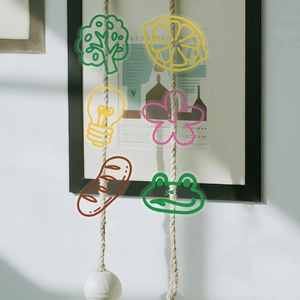 Close-up of transparent cartoon PET stickers featuring nature and food illustrations