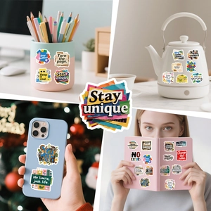 Inspirational English quote stickers shown on phone case and office desk accessories