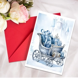Detailed view of watercolor blue Christmas card with silver sleigh and red envelope
