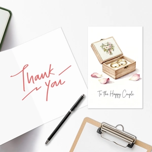 Detailed view of wedding card set with Thank You note and To the Happy Couple illustration