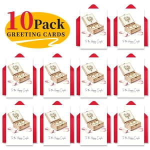 Detail of 10 pack wedding cards with To the Happy Couple print and red envelopes