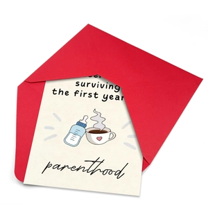 Surviving the first year parenthood greeting card set with red envelope on white backdrop