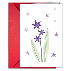 Detailed view of floral greeting card with purple stars and matching red envelope