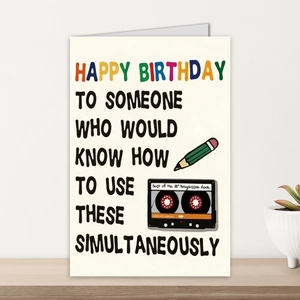 Detail of funny birthday card with cassette tape illustration on cream art paper