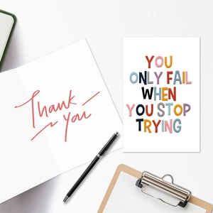 Flat lay of motivational cards with Thank You note and inspirational quote on white background
