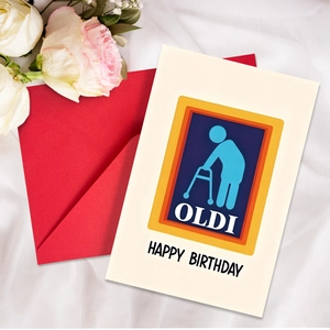 Funny OLDI birthday card with red envelope set on white elegant fabric background