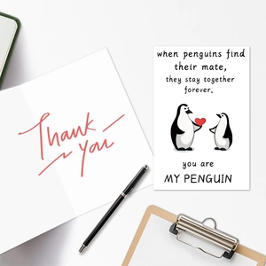 Detailed flat lay of cartoon animal Valentine greeting cards with pens and clipboard
