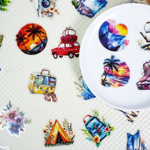 Macro shot of 56 watercolor travel stickers with vintage cars and beach themes