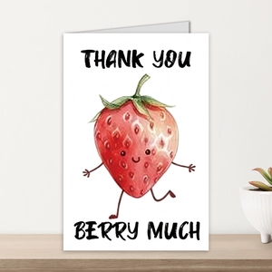 Greeting card with watercolor strawberry and Thank You Berry Much pun in a cozy setting