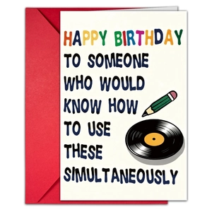 Close-up of a humor-themed birthday card with illustrations and a vibrant red envelope