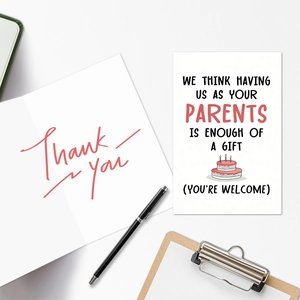Macro view of a humorous birthday card with funny text and a minimalist cake illustration