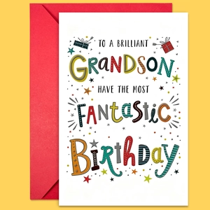 Dettaglio del biglietto di auguri per il nipote con busta rossa e stelline
