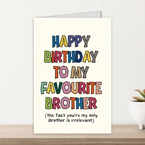 Detailed view of a colorful birthday card for brother on a minimalist wooden shelf