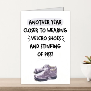 Detail of funny birthday card with watercolor sneaker illustration and humorous quote