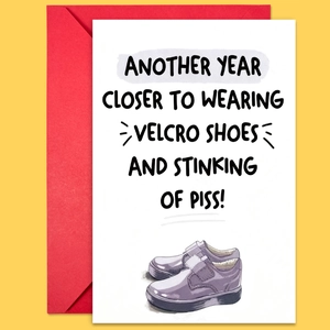 Funny birthday card with humorous aging text and purple sneakers next to a red envelope