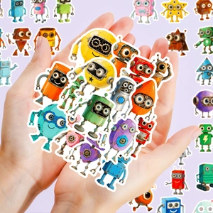 Close-up of colorful cartoon robot stickers held in hands for size demonstration