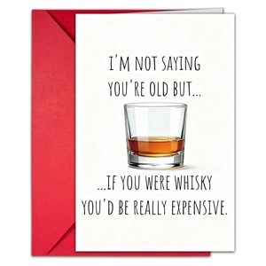 Detail of humorous birthday card with whiskey glass design and matching red envelope