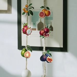 Detalle de pegatinas realistas de frutas en PET con diseños de higos, granadas y naranjas