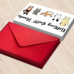 Cartoon dog illustration thank you card set with red envelope on wood background