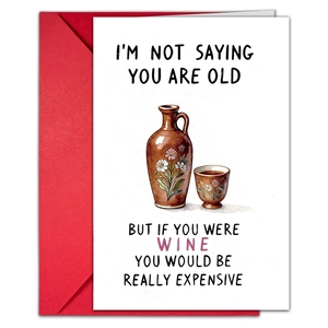 Detail of funny birthday card with red envelope and humorous wine quote for adults