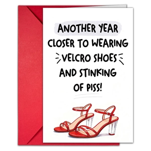 Detail view of a funny birthday card with a red envelope and high heel illustration