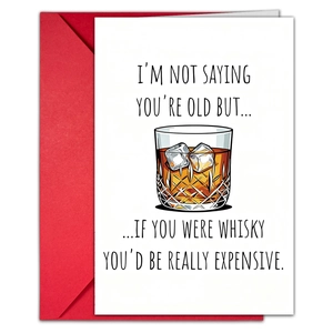 Macro detail of humor birthday card featuring whisky glass illustration and red envelope