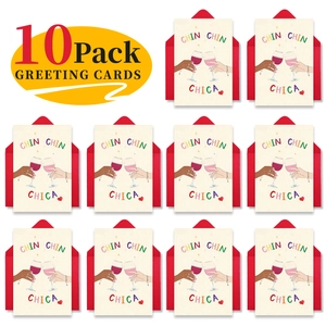 Detailansicht der 10er-Pack Grußkarten mit anstoßenden Weingläsern und Umschlägen