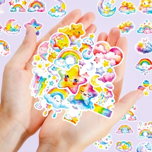 Detail of colorful watercolor stickers showing cute stars, clouds and rainbows for DIY crafts
