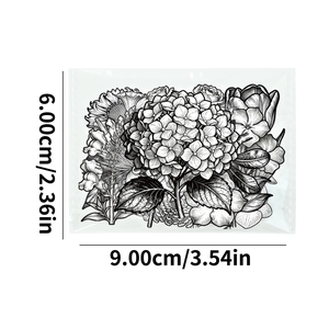 Macro view of black and white floral PET sticker showing hydrangea and sunflower line art