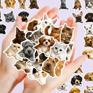 Close-up showing a large stack of waterproof pet stickers in a hand to show quantity
