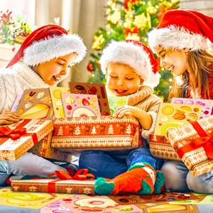 Children in Santa hats opening dessert puzzle sticker gift boxes in a festive holiday scene